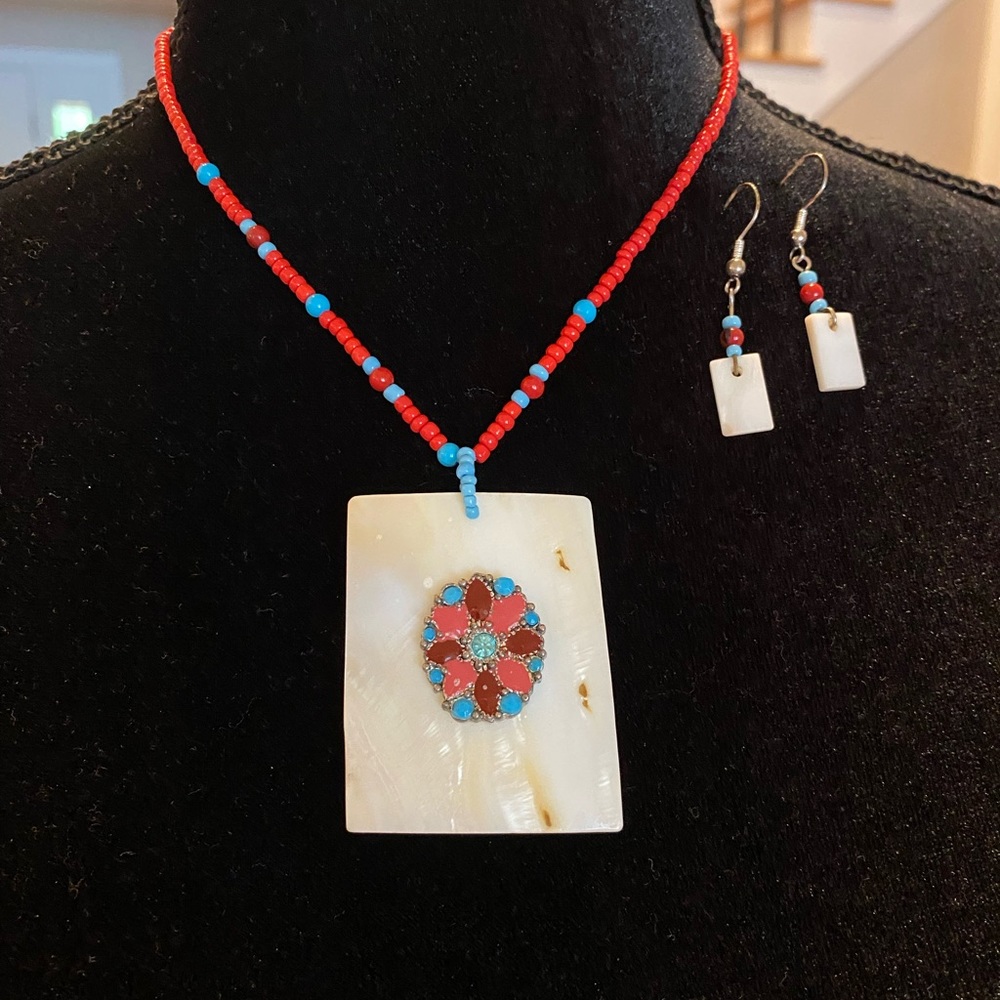 Beautiful white, red and turquoise necklace and earrings.
